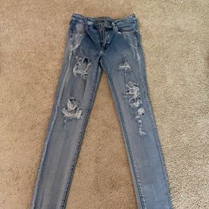 Heavily ripped jeans